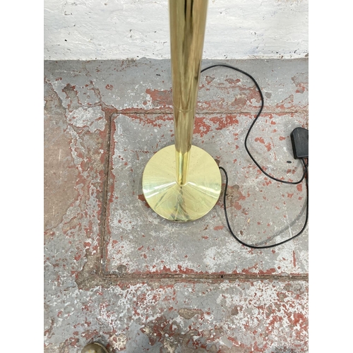 1178B - Two modern standard lamps, one brass effect - approx. 180cm high and one brushed steel effect with r... 