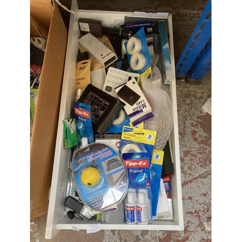 1738 - Two boxes of assorted items to include hand tools, batteries, light bulbs, four way extension leads,... 