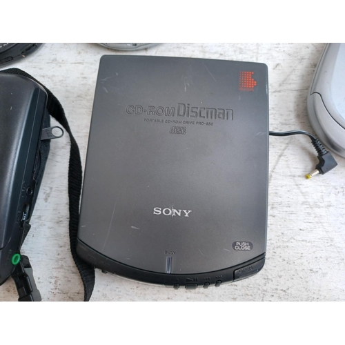 1301 - A collection of personal CD players to include Sony PRD-650 CD-ROM Discman, cased Philips AZT3202/01... 