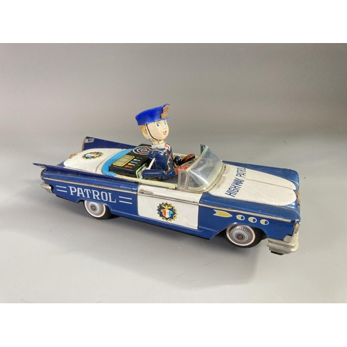 637 - A 1960's Japanese tinplate Highway Patrol battery operated toy car - approx. 13cm high x 10cm wide x... 