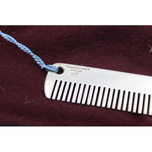 231 - A boxed stamped .925 sterling silver Penhaligon's plain comb with blue tassel - approx. gross weight... 