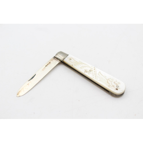 240 - Two antique hallmarked .925 sterling silver fruit knives with mother of pearl handles - approx. gros... 