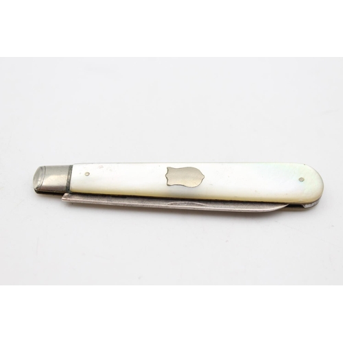 240 - Two antique hallmarked .925 sterling silver fruit knives with mother of pearl handles - approx. gros... 