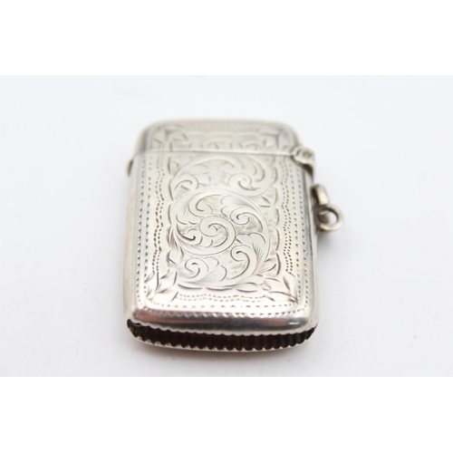 243 - An antique T. Heatley hallmarked Birmingham sterling silver vesta case, dated 1911 - approx. gross w... 