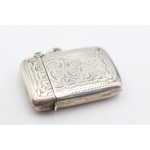 243 - An antique T. Heatley hallmarked Birmingham sterling silver vesta case, dated 1911 - approx. gross w... 