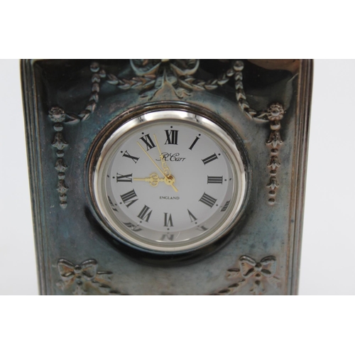 244 - Two R. Carr hallmarked .925 silver fronted bedside quartz clocks