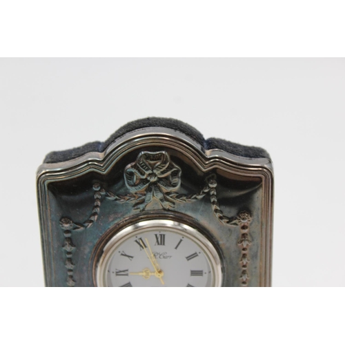 244 - Two R. Carr hallmarked .925 silver fronted bedside quartz clocks