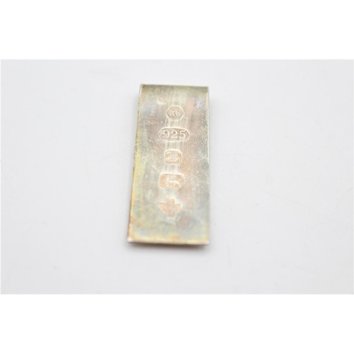 251 - An R. Carr hallmarked .925 sterling silver Millennium money clip - approx. gross weight 14 grams and... 