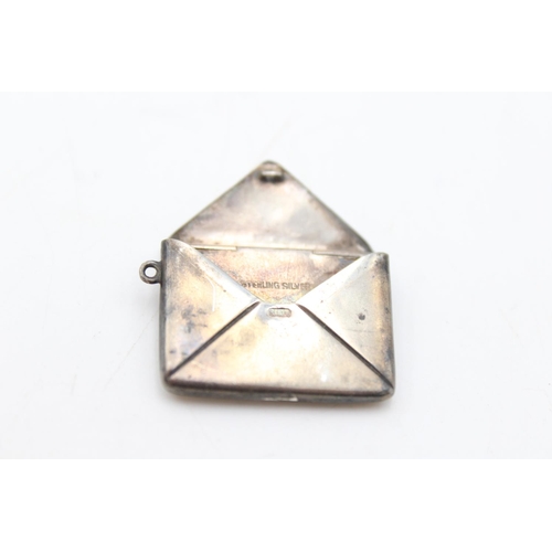 254 - An antique stamped .925 sterling silver envelope stamp case - approx. gross weight 4 grams and 3.2cm... 