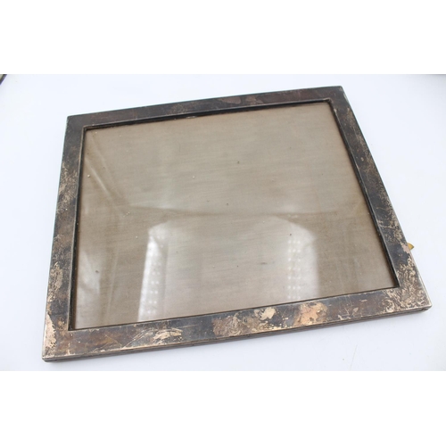 262 - Three hallmarked .925 sterling silver photo frames - largest approx. 29.5cm high x 24.5cm wide