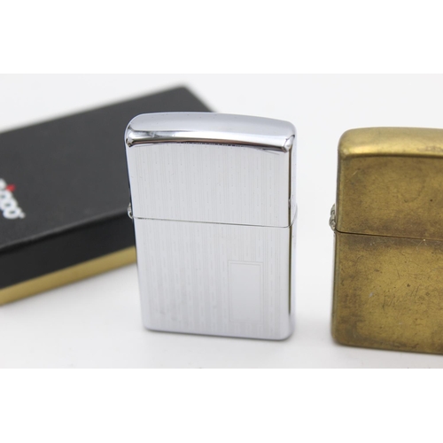 90 - Three assorted Zippo cigarette lighters