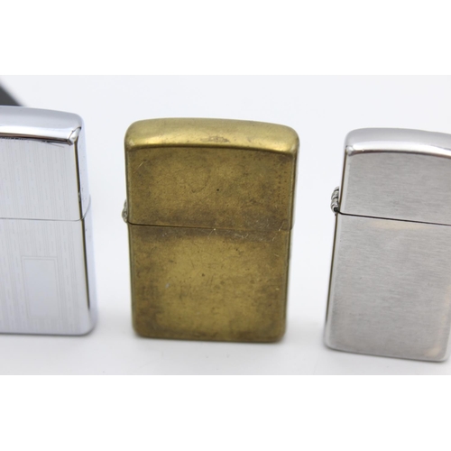 90 - Three assorted Zippo cigarette lighters