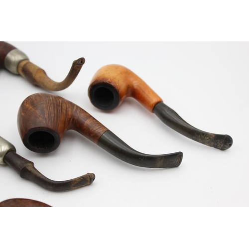 91 - Five assorted vintage Estate smoking pipes to include Peterson's, Meerschaum etc.