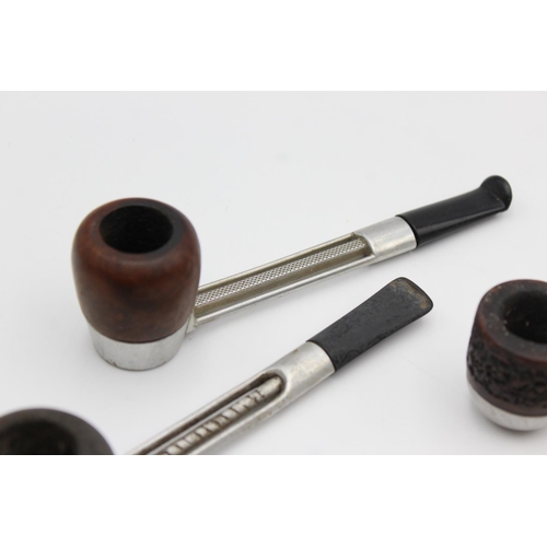 96 - Four assorted vintage Estate smoking pipes to include Falcon, Super Twist and Viking