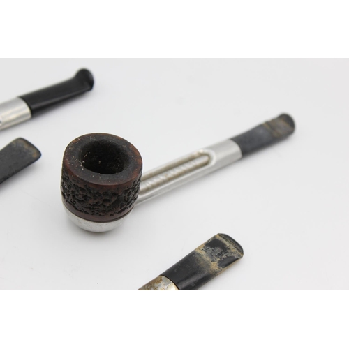 96 - Four assorted vintage Estate smoking pipes to include Falcon, Super Twist and Viking