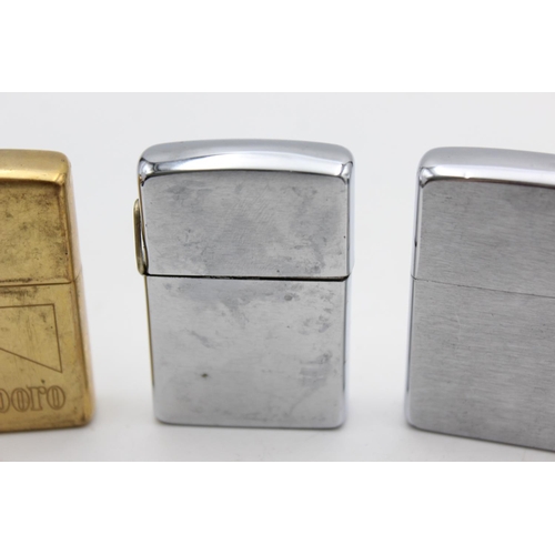 97 - Three assorted Zippo cigarette lighters