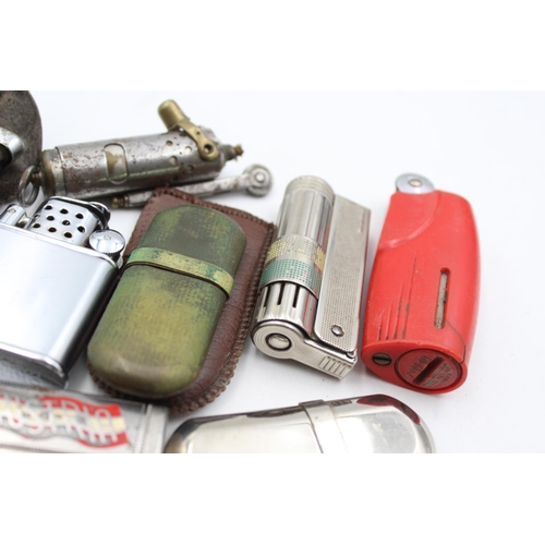 104 - Nine assorted vintage lighters to include Imco, Orlik Sport etc.