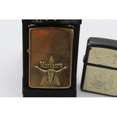 114 - Three assorted Zippo cigarette lighters