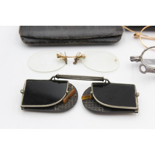 127 - Eight pairs of antique and vintage spectacles and sunglasses