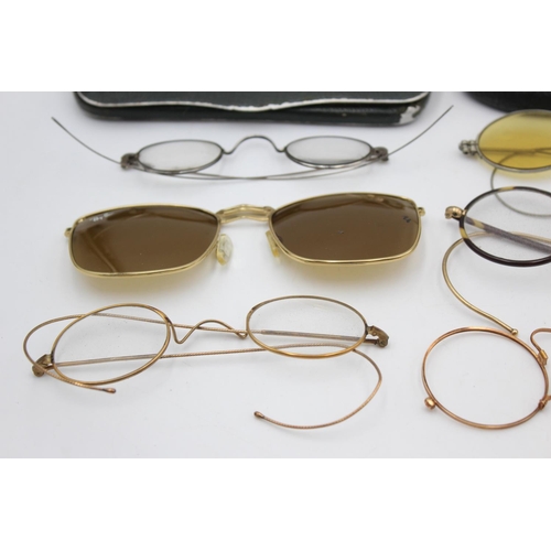 128 - Eight pairs of antique and vintage spectacles