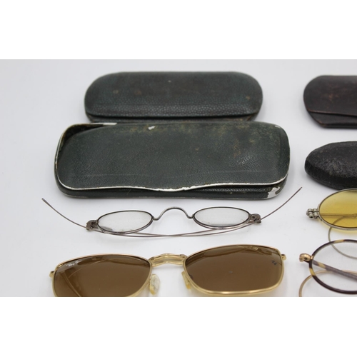 128 - Eight pairs of antique and vintage spectacles