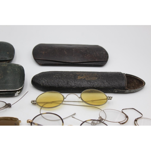 128 - Eight pairs of antique and vintage spectacles