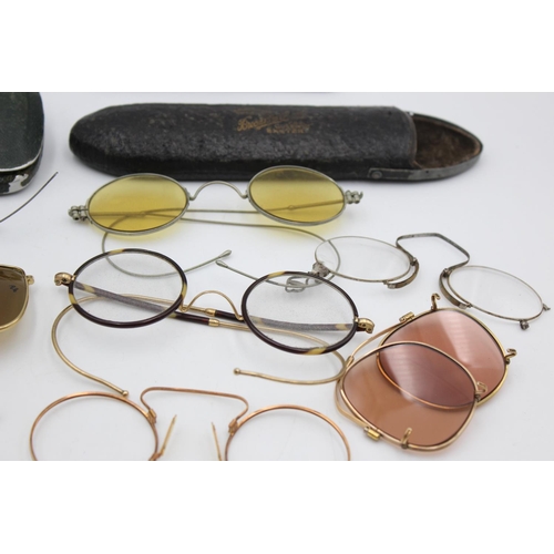 128 - Eight pairs of antique and vintage spectacles