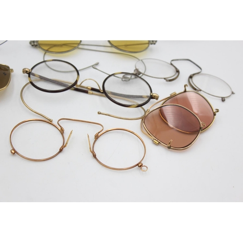 128 - Eight pairs of antique and vintage spectacles