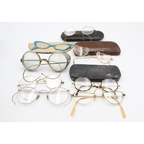 129 - Eight pairs of antique and vintage spectacles