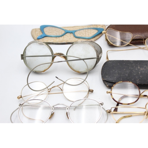 129 - Eight pairs of antique and vintage spectacles