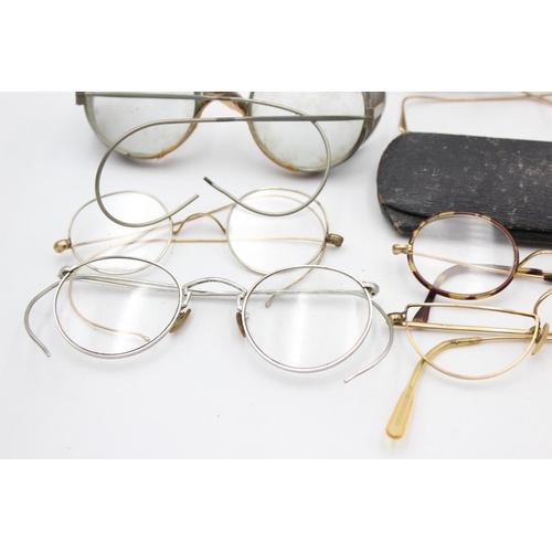 129 - Eight pairs of antique and vintage spectacles