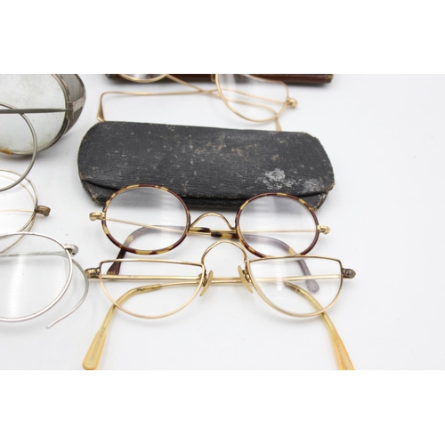 129 - Eight pairs of antique and vintage spectacles