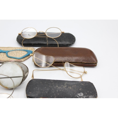 129 - Eight pairs of antique and vintage spectacles