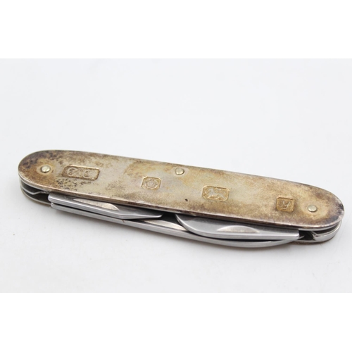 221 - A vintage hallmarked Sheffield sterling multi-tool pocket knife, dated 1998 - approx. gross weight 8... 