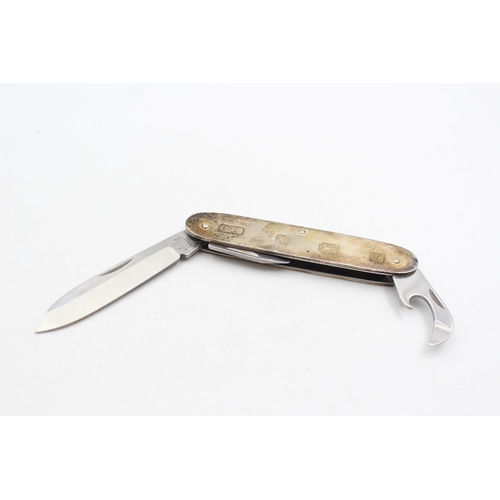 221 - A vintage hallmarked Sheffield sterling multi-tool pocket knife, dated 1998 - approx. gross weight 8... 