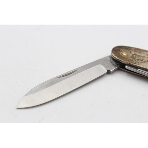 221 - A vintage hallmarked Sheffield sterling multi-tool pocket knife, dated 1998 - approx. gross weight 8... 