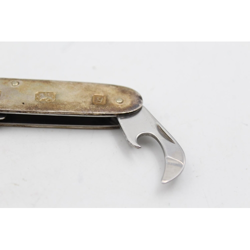 221 - A vintage hallmarked Sheffield sterling multi-tool pocket knife, dated 1998 - approx. gross weight 8... 