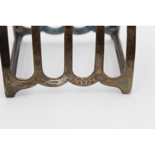 259 - A vintage Bishton's Ltd. hallmarked 1943 Birmingham sterling silver 5 bar toast rack, dated 1943 - a... 