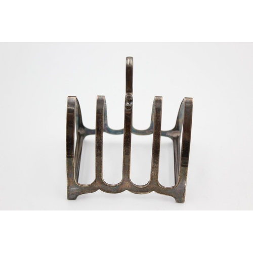 259 - A vintage Bishton's Ltd. hallmarked 1943 Birmingham sterling silver 5 bar toast rack, dated 1943 - a... 