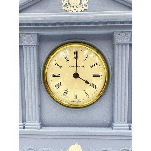 60 - A Wedgwood pale blue Jasperware mantel clock - approx. 20.5cm high x 15cm wide x 6cm deep