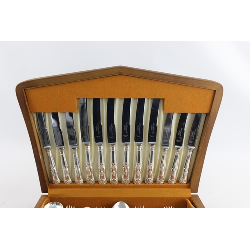 118 - A vintage Smith Seymour forty four piece silver plate Kings pattern cutlery set in wooden case