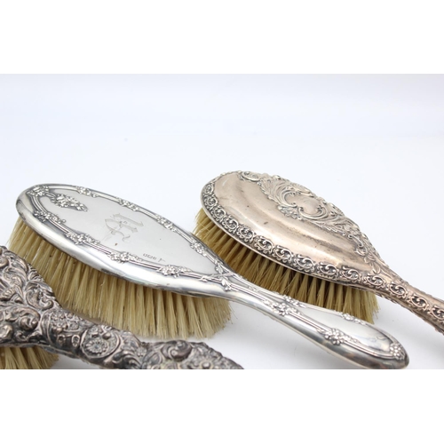 1362 - Eight antique hallmarked .925 sterling silver women's vanity items to include brushes, handled tools... 