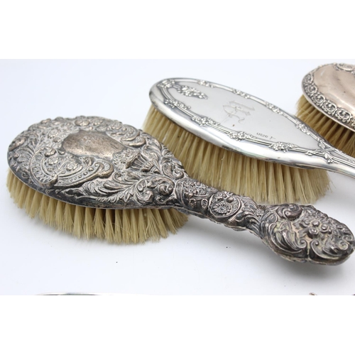 1362 - Eight antique hallmarked .925 sterling silver women's vanity items to include brushes, handled tools... 