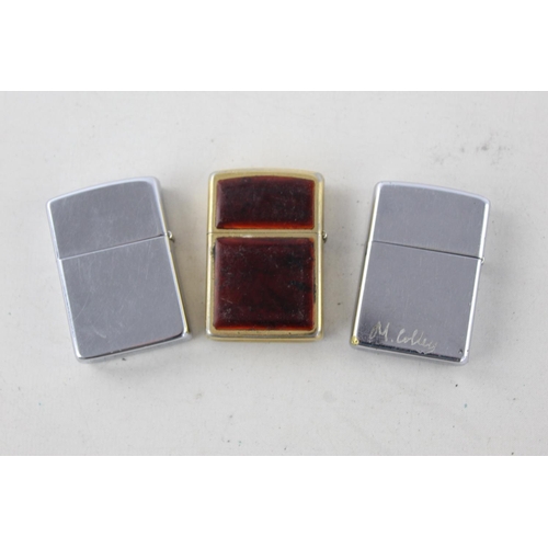 1372 - Three assorted Zippo cigarette lighters