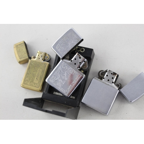 1373 - Three assorted Zippo cigarette lighters