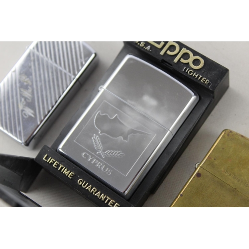 1374 - Three assorted Zippo cigarette lighters