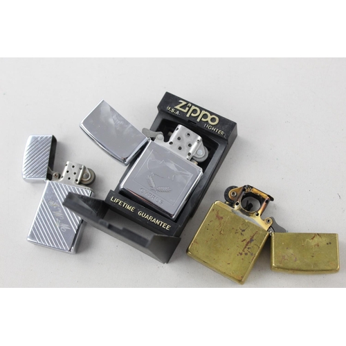 1374 - Three assorted Zippo cigarette lighters