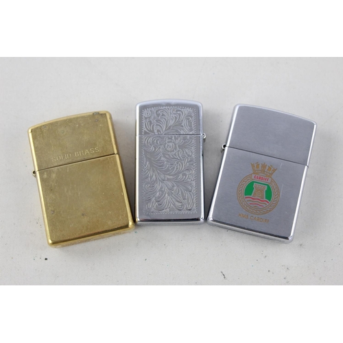 1375 - Three assorted Zippo cigarette lighters