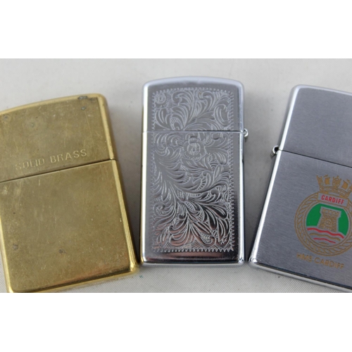 1375 - Three assorted Zippo cigarette lighters