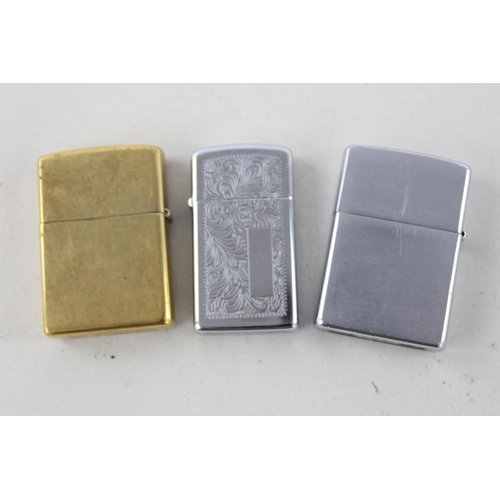 1375 - Three assorted Zippo cigarette lighters